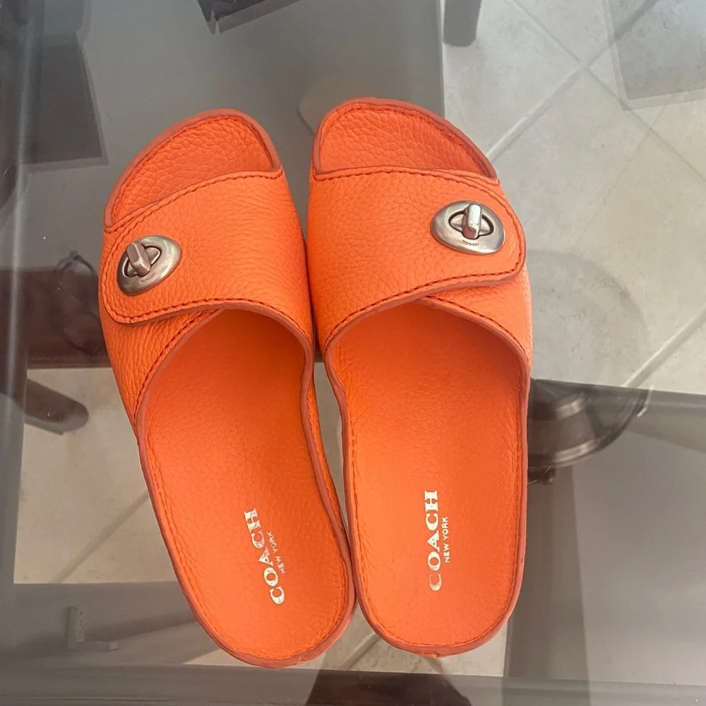 Coach Orange Leather Slide Mules with Turn-Lock Accent
